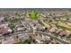 Large aerial view of community and golf course at 19562 N Wikieup Ct, Surprise, AZ 85374