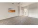 Comfortable bedroom with carpet and ample closet space at 19562 N Wikieup Ct, Surprise, AZ 85374