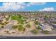 Aerial view of community near golf course at 19562 N Wikieup Ct, Surprise, AZ 85374