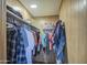 Walk-in closet with ample shelving and hanging space at 260 S 72Nd Pl, Mesa, AZ 85208