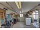 Workshop with tools, shelves, and laundry hookups at 260 S 72Nd Pl, Mesa, AZ 85208