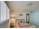 Bedroom with a double bed, nightstand, and wood floors at 260 S 72Nd Pl, Mesa, AZ 85208