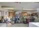 Workshop with tools, shelves, and laundry area at 260 S 72Nd Pl, Mesa, AZ 85208