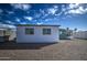 White storage shed in backyard at 260 S 72Nd Pl, Mesa, AZ 85208