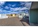 Large backyard with shed and gravel landscaping at 260 S 72Nd Pl, Mesa, AZ 85208