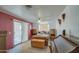 Spacious bedroom with wood furniture, sliding door to patio at 260 S 72Nd Pl, Mesa, AZ 85208
