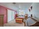 Bright bedroom with double bed, dresser, and plenty of closet space at 260 S 72Nd Pl, Mesa, AZ 85208