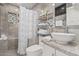 Clean bathroom with updated vanity and walk-in shower at 2518 E Campbell Ave, Phoenix, AZ 85016