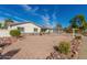 Charming single-story home with a well-maintained front yard and rock landscaping at 2518 E Campbell Ave, Phoenix, AZ 85016