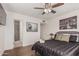 Serene bedroom with a comfortable bed and en-suite bathroom access at 2518 E Campbell Ave, Phoenix, AZ 85016