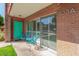 Mid-century modern condo with teal door and private patio at 103 E Palm Ln # A, Phoenix, AZ 85004