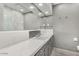 Clean bathroom with gray tile and updated fixtures at 103 E Palm Ln # A, Phoenix, AZ 85004