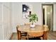 Mid-century modern dining set with wood table and chairs at 103 E Palm Ln # A, Phoenix, AZ 85004