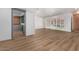Open living area with wood-look flooring and access to patio at 103 E Palm Ln # A, Phoenix, AZ 85004