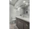 Updated bathroom, featuring a gray vanity and a walk-in shower at 103 E Palm Ln # A, Phoenix, AZ 85004