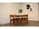 Mid-century modern dining set with wood table and chairs at 103 E Palm Ln # A, Phoenix, AZ 85004
