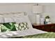 Bright bedroom with leafy green accents and a comfy bed at 103 E Palm Ln # A, Phoenix, AZ 85004