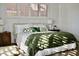 Spacious bedroom with large windows and soft green throw at 103 E Palm Ln # A, Phoenix, AZ 85004