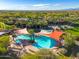 Relaxing resort pool area with shaded seating and spa at 27789 N 129Th Ln, Peoria, AZ 85383
