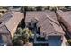 Aerial view of single-story house with tile roof and two-car garage at 27789 N 129Th Ln, Peoria, AZ 85383