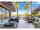 Outdoor lounge area with patio furniture and water feature at 27789 N 129Th Ln, Peoria, AZ 85383