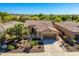 Single story home with tile roof and two car garage at 27789 N 129Th Ln, Peoria, AZ 85383