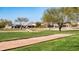 Landscaped golf course with a view of houses at 27789 N 129Th Ln, Peoria, AZ 85383