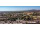 Aerial view showing community entrance and surrounding golf course at 27789 N 129Th Ln, Peoria, AZ 85383