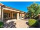 Large covered patio with hot tub and access to backyard at 27789 N 129Th Ln, Peoria, AZ 85383
