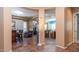 Elegant entryway with a view into the kitchen and living areas at 27789 N 129Th Ln, Peoria, AZ 85383