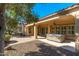 Spacious covered patio with hot tub and ceiling fan at 27789 N 129Th Ln, Peoria, AZ 85383