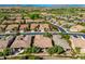 Community view showing neighborhood homes and golf course at 27789 N 129Th Ln, Peoria, AZ 85383