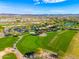Expansive golf course with putting green and clubhouse at 27789 N 129Th Ln, Peoria, AZ 85383