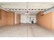 Spacious garage with built-in storage cabinets at 27789 N 129Th Ln, Peoria, AZ 85383