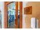 Entrance to fitness studio with wood door and sign at 27789 N 129Th Ln, Peoria, AZ 85383
