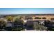 Community clubhouse with palm trees and golf course views at 27789 N 129Th Ln, Peoria, AZ 85383