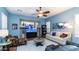 Bright living room with comfy seating and built-in entertainment center at 27789 N 129Th Ln, Peoria, AZ 85383