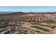 Aerial view of community with golf course and mountain views at 27789 N 129Th Ln, Peoria, AZ 85383
