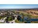 Aerial view of luxury community with golf course, pools, and palm trees at 27789 N 129Th Ln, Peoria, AZ 85383