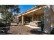 Backyard oasis featuring a hot tub and grilling area at 27789 N 129Th Ln, Peoria, AZ 85383