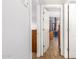 Hallway with light walls and wood-look floors at 2132 W Glenrosa Ave # 81D, Phoenix, AZ 85015