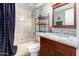 Bathroom with shower/tub, granite vanity, and linen shelf at 2132 W Glenrosa Ave # 81D, Phoenix, AZ 85015