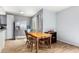 Small dining area with wooden table and chairs at 2132 W Glenrosa Ave # 81D, Phoenix, AZ 85015