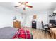 Bedroom with bed, dresser, and workspace at 2132 W Glenrosa Ave # 81D, Phoenix, AZ 85015