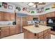 Kitchen with granite countertops and wood cabinets at 2166 E Caroline Ln, Tempe, AZ 85284