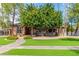 Brick house with a well-maintained lawn and walkway at 2166 E Caroline Ln, Tempe, AZ 85284