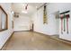 Spacious garage with ample storage cabinets and epoxy flooring at 2166 E Caroline Ln, Tempe, AZ 85284