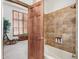 Clean bathroom with tile shower and bathtub at 2166 E Caroline Ln, Tempe, AZ 85284