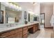 Double vanity bathroom with granite countertops at 2166 E Caroline Ln, Tempe, AZ 85284