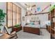 Comfortable bedroom with wood furniture and a built-in desk at 2166 E Caroline Ln, Tempe, AZ 85284